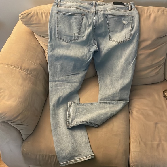 Original Use- Stone washed taper ripped jeans. - Picture 3 of 4